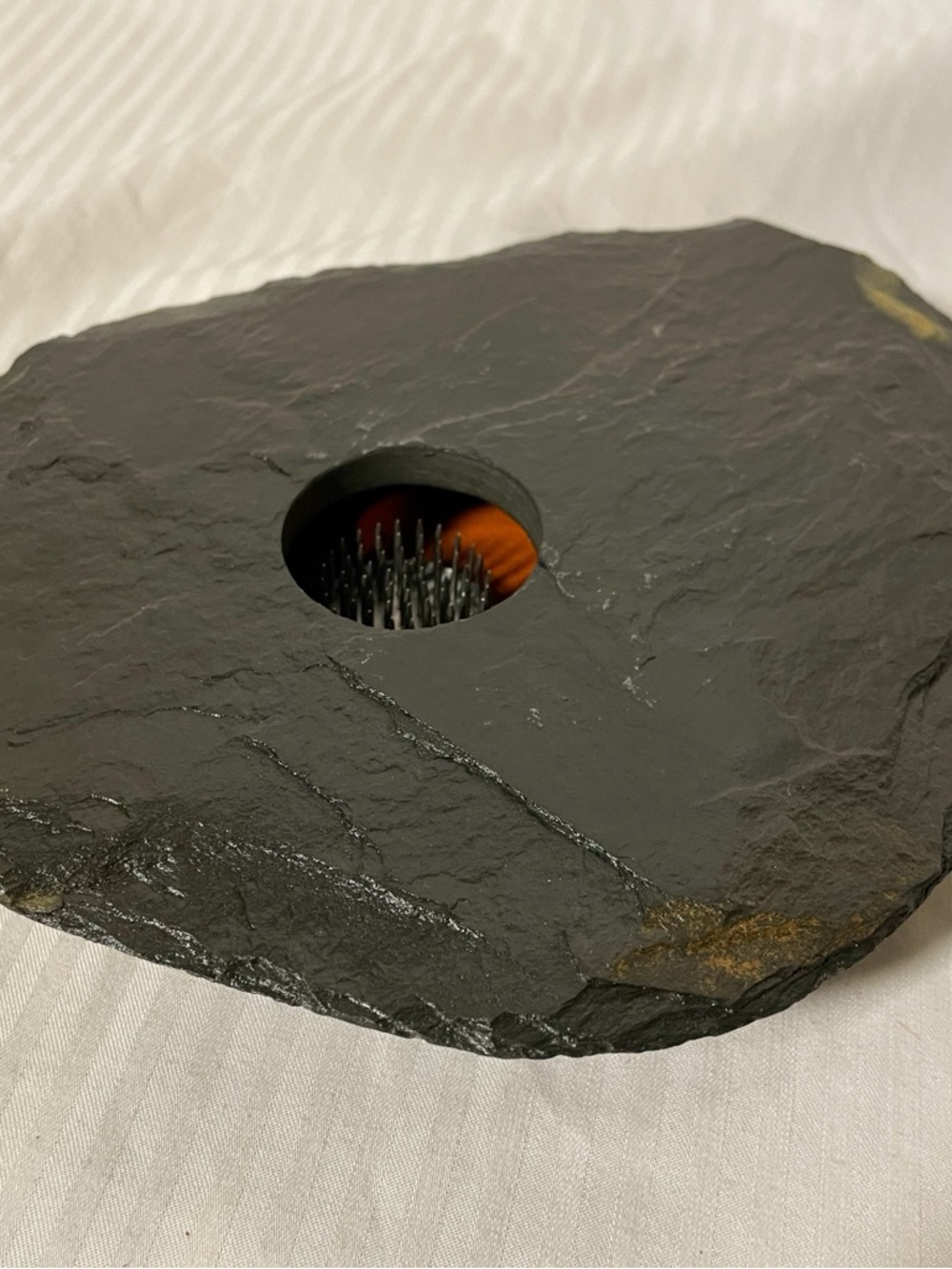 Ikebana flower vase with black slate top and attached frog in bottom well.